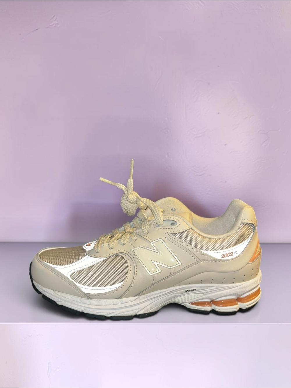 New Balance Women’s 2002R Beige, White & Orange Accent Sneakers